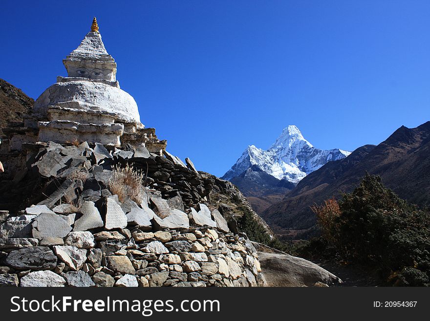 Himalayan Everest Mountain range. with stupa in the foreground, background mountain is Ama Dablam. Himalayan Everest Mountain range. with stupa in the foreground, background mountain is Ama Dablam