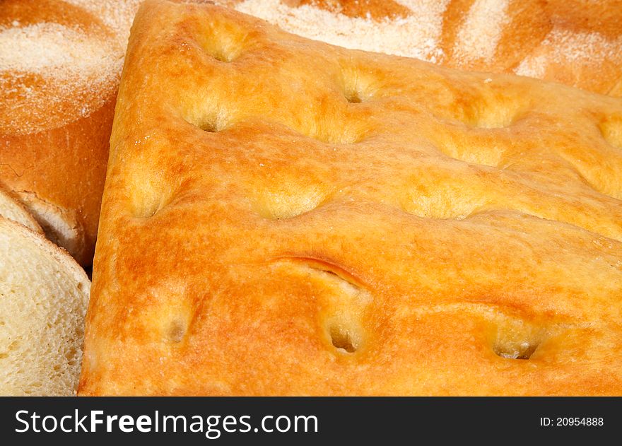 Close up genoese (or genovese) focaccia and bread. Close up genoese (or genovese) focaccia and bread