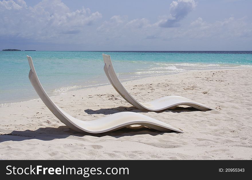 Beach bed on a Maldivian sandy beach. Beach bed on a Maldivian sandy beach