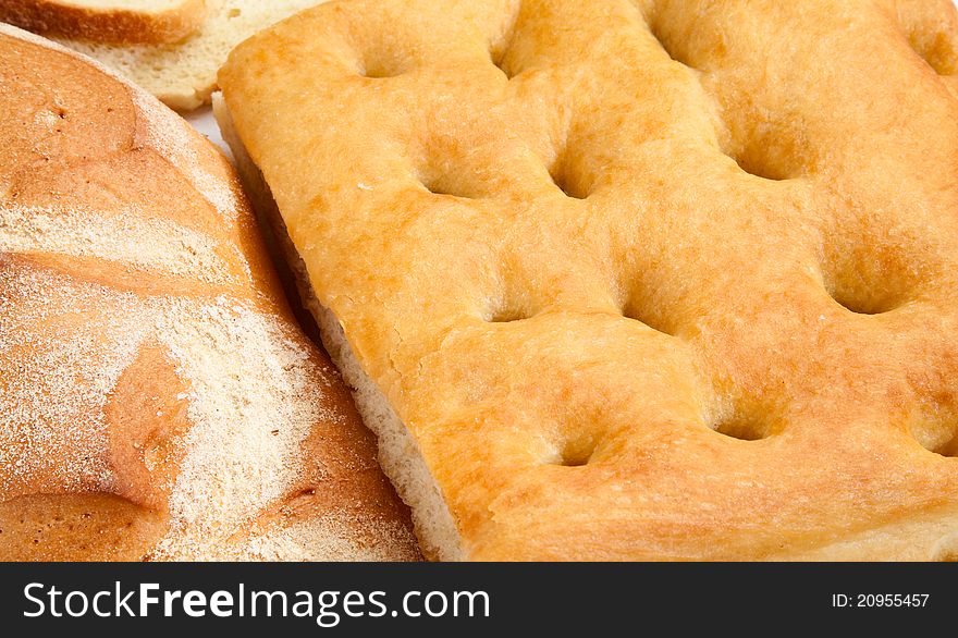 Closeup of genoese focaccia and bread.