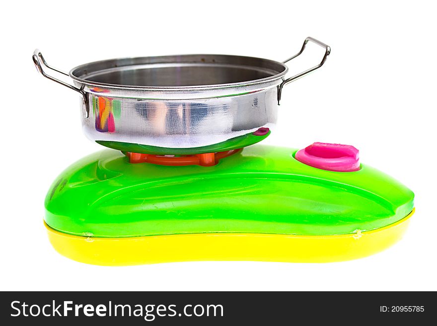 Child plastic pot cooking toy on white