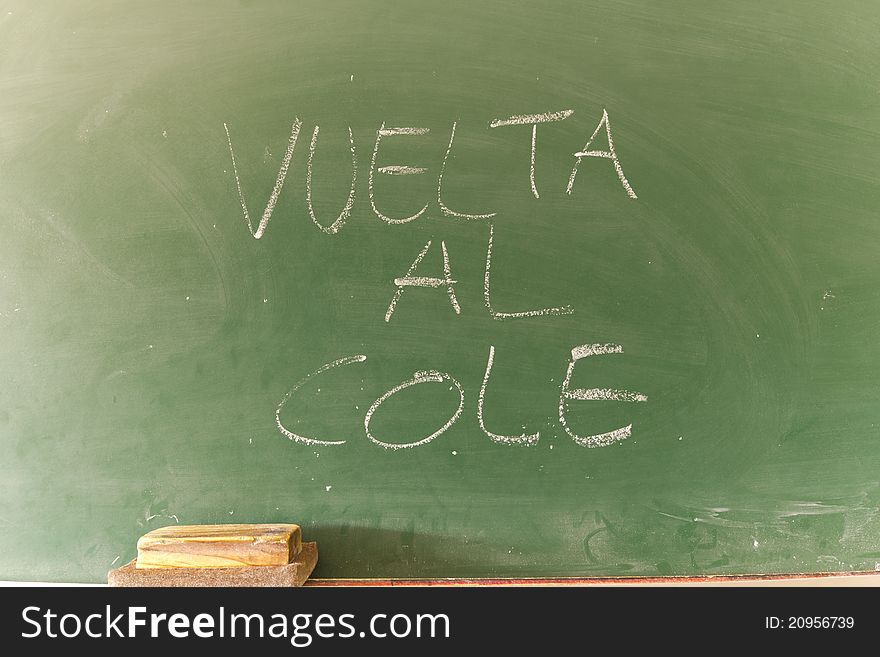 Writing with chalk on a blackboard in a school. Writing with chalk on a blackboard in a school