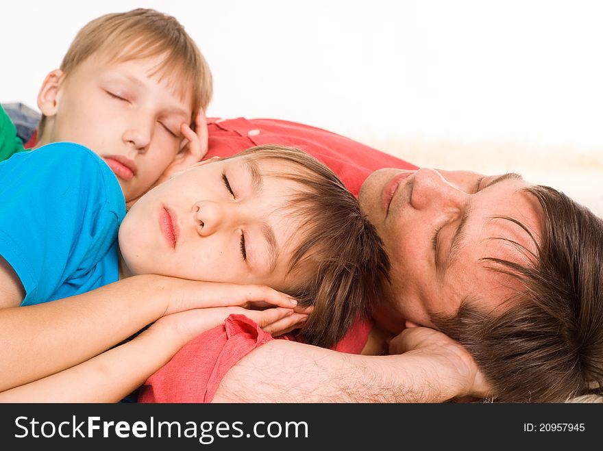 Dad and sons sleeping