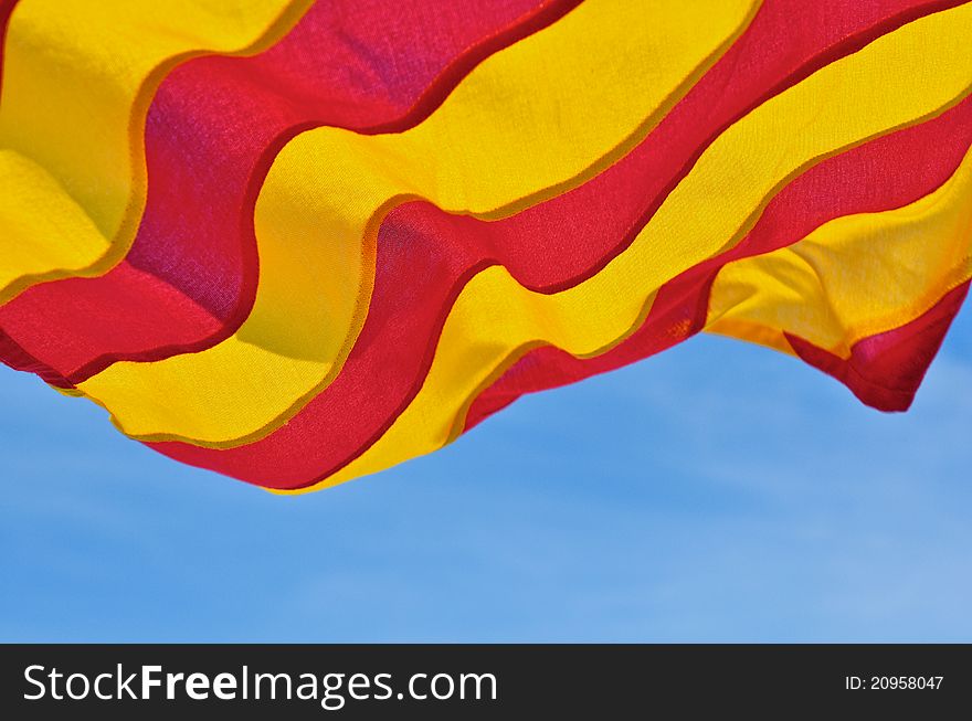 Maritime signal flag against the blue sky.