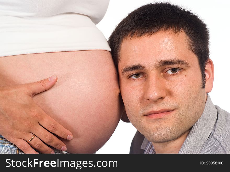 Pregnant women with men on a white background. Pregnant women with men on a white background