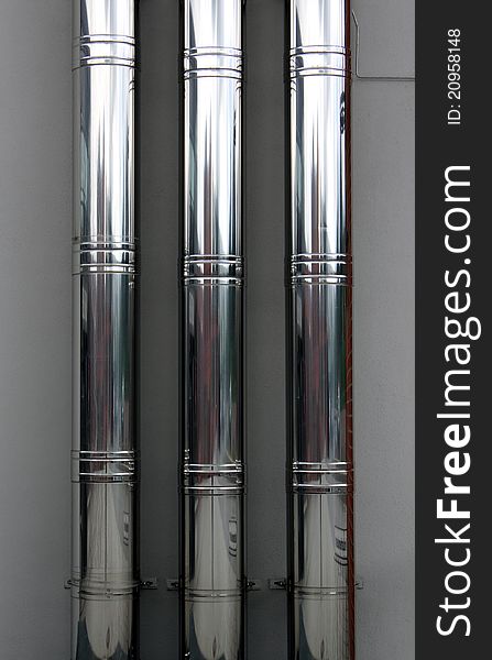 Three steel metal long tubes. Three steel metal long tubes