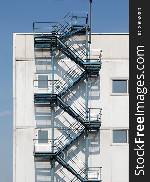 Technical, fire-escape ladder at factory or storehouse. Technical, fire-escape ladder at factory or storehouse