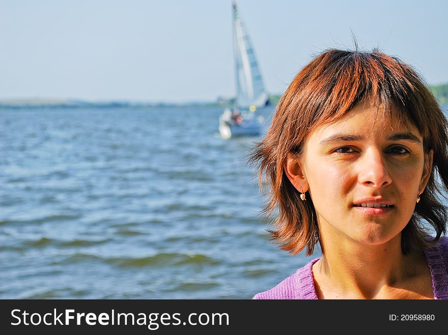 Beautiful young woman near the lake. Beautiful young woman near the lake