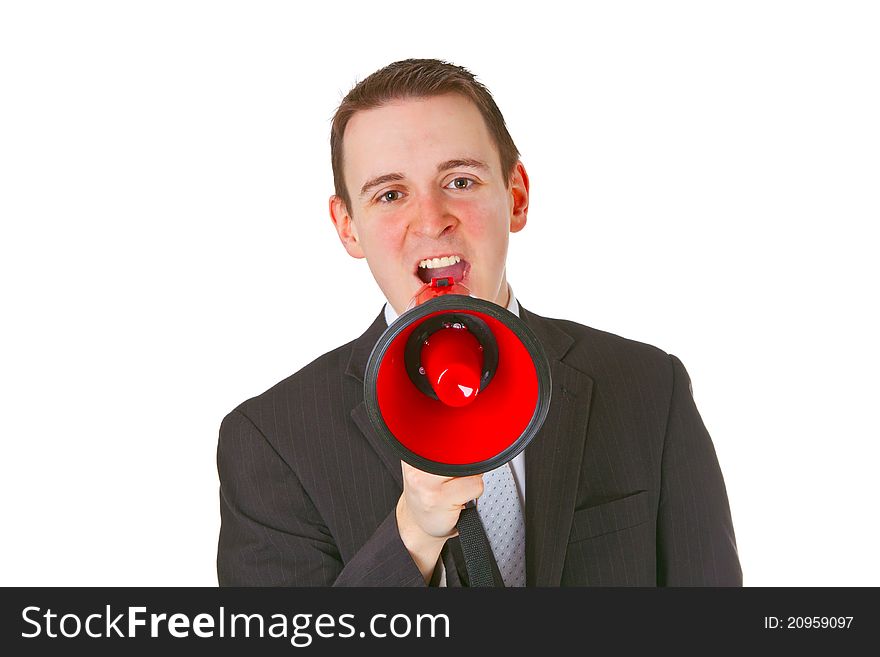 Businessman yelling through a megaphone isolated on white background