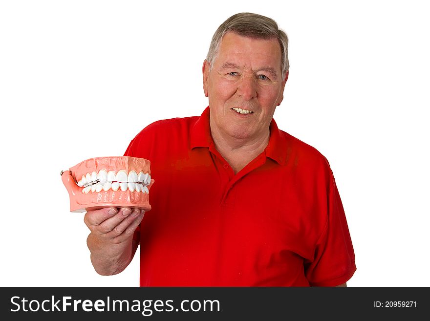 Friendly male senior present teeth model isolated on white background. Friendly male senior present teeth model isolated on white background