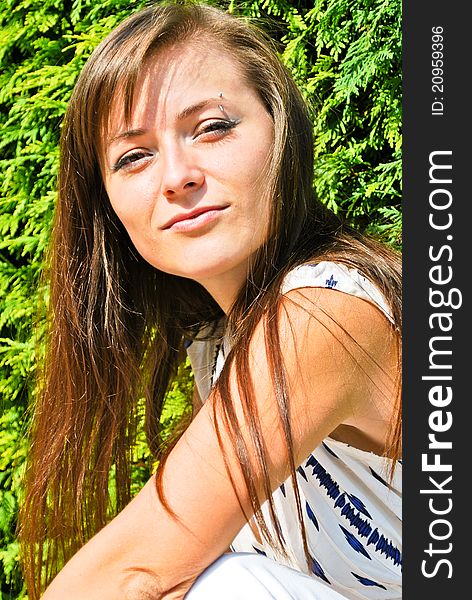 Beautiful Ukrainian girl standing in the park. Beautiful Ukrainian girl standing in the park