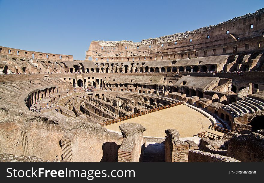 View of the colosseum's interior including the arena and seating
