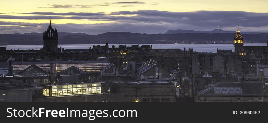 A view of the Edinburgh skyline around twilight, with the Firth of Forth and the Kingdom of Fife in the background. A view of the Edinburgh skyline around twilight, with the Firth of Forth and the Kingdom of Fife in the background.