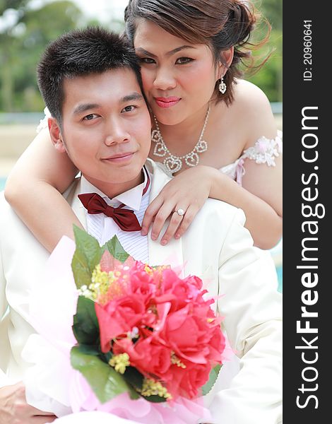 Wedding suit of couple outdoor light