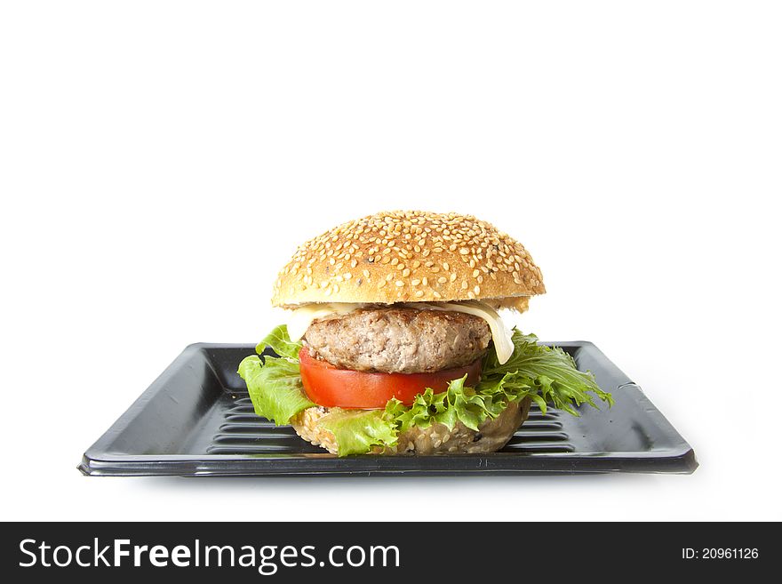 Hamburger, A beef hamburger with fresh vegetable.