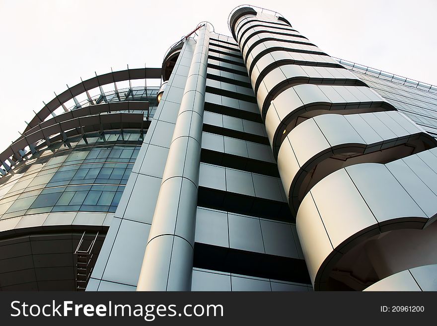 Side lower angle view of a Futuristic looking building. Side lower angle view of a Futuristic looking building