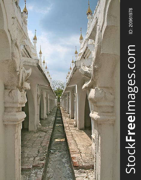 White stupas in Kuthodaw temple in Mandalay, Myanmar (Burma).