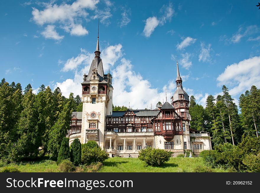 Idyllic royal castle in a mountain forest
