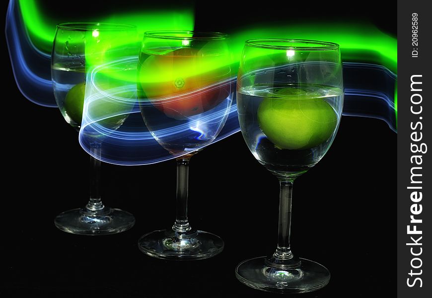 Light trail with the glass and the vegetables inside it. Light trail with the glass and the vegetables inside it.