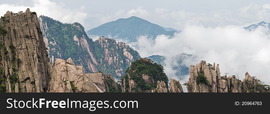 Cloudscape image of Huangshan (yellow mountain) and pine tree on the top(like avatar). Foggy day, Huang Shan, China. Cloudscape image of Huangshan (yellow mountain) and pine tree on the top(like avatar). Foggy day, Huang Shan, China.