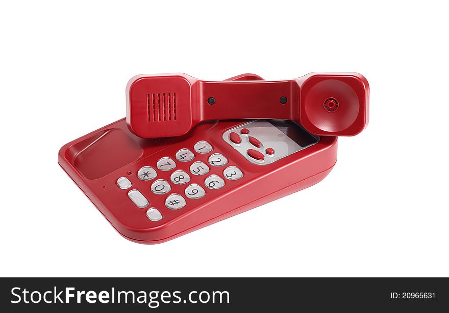 Ordinary red telephone on white background. Isolated with clipping path