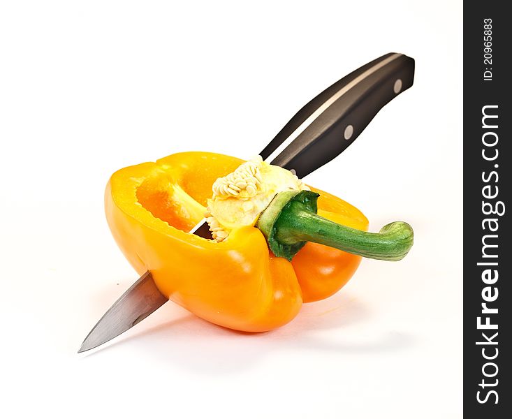 Cut yellow paprika with knife