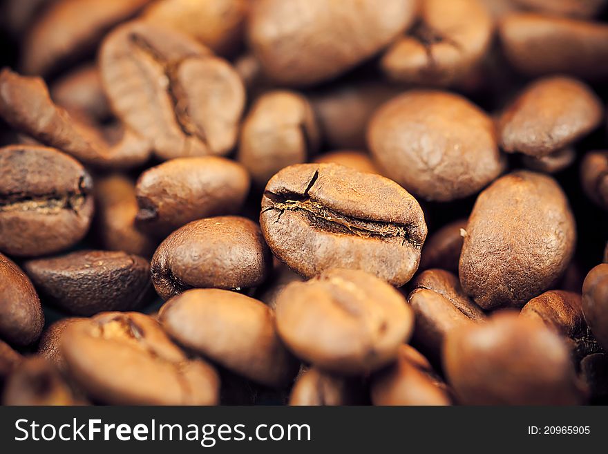 Brown coffee beans as background and texture