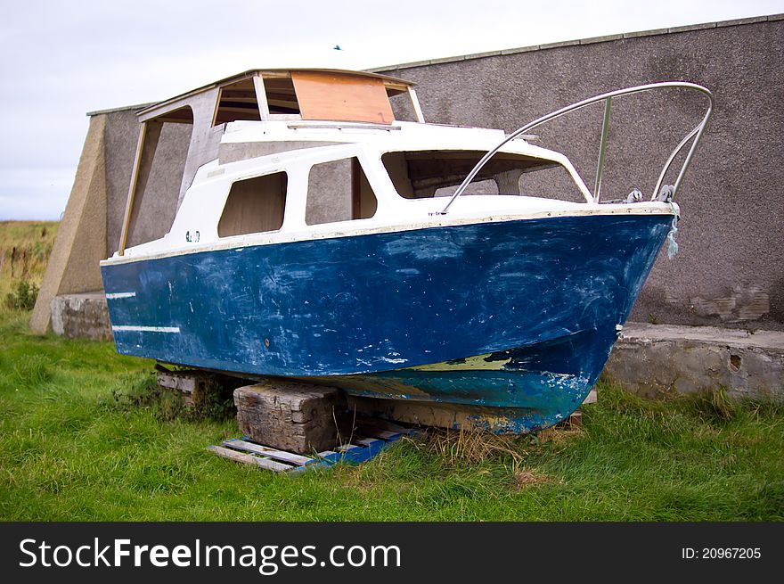 Old and unused blue boat