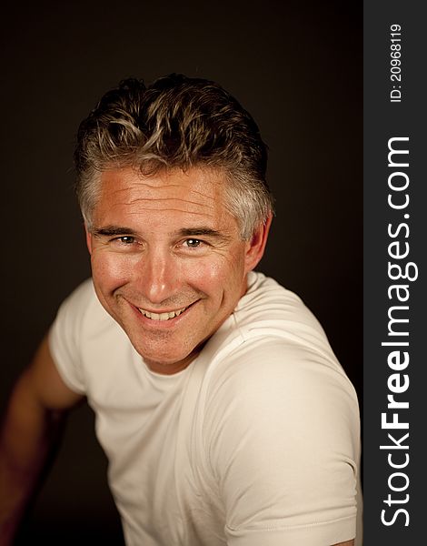 Businessman portrait shot over grey background