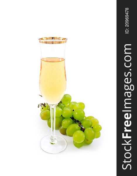 Glass of white wine on a white background. Glass of white wine on a white background