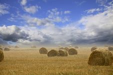 Straw Bales On Farmland With Cloudy Sky Stock Photography Straw Bales On Farmland With Cloudy Sky Stock Photography