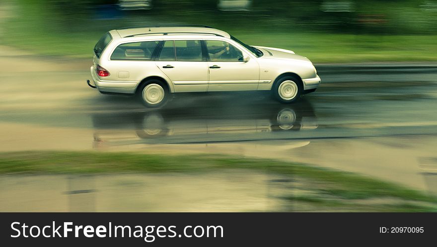 An image of car moving very fast. An image of car moving very fast