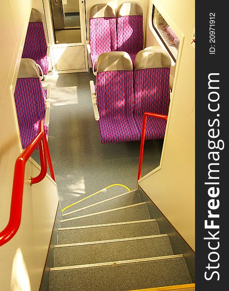 New czech train double-decker interior, view of staircase and seats. New czech train double-decker interior, view of staircase and seats.
