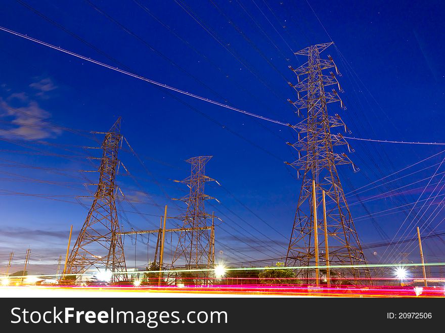 Electric high voltage power post and blue sky