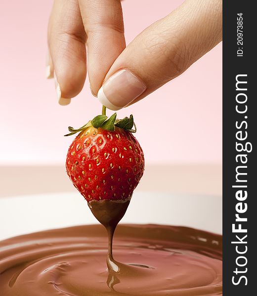 Fresh strawberry dipped in the chocolate melt. Fresh strawberry dipped in the chocolate melt