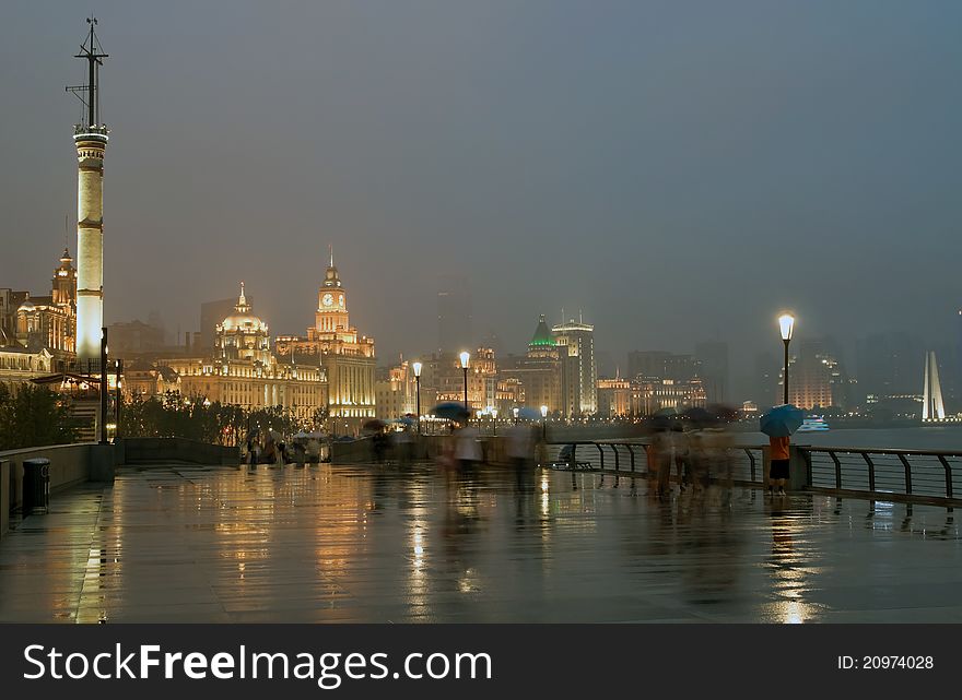 Image of Bund in Shanghai at night and rain, China