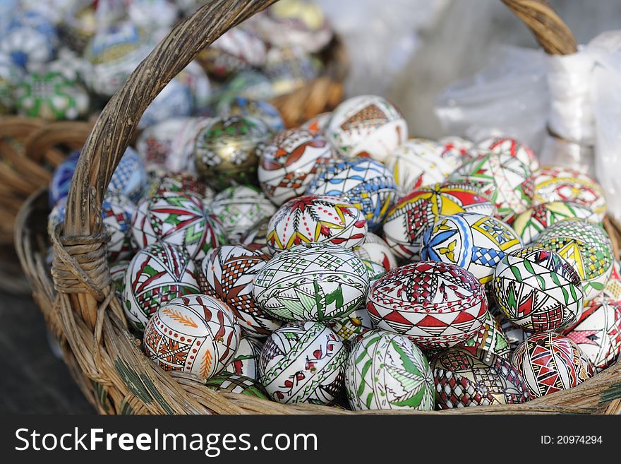 Closeup with traditional easter eggs in basket