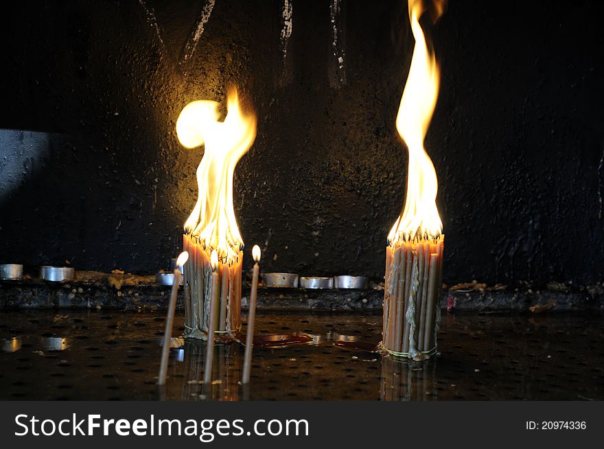 Closeup with religious burning candles. Closeup with religious burning candles