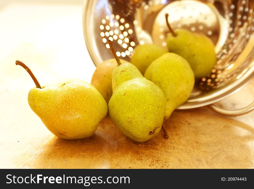 Fresh pears from tree still wet