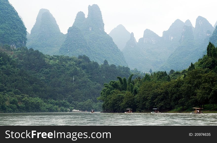 Traveling People Through Valley Of Li River