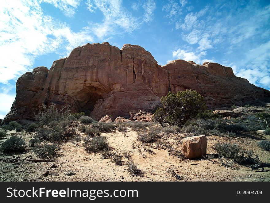 Arches National Park with dramatic late-day sun.