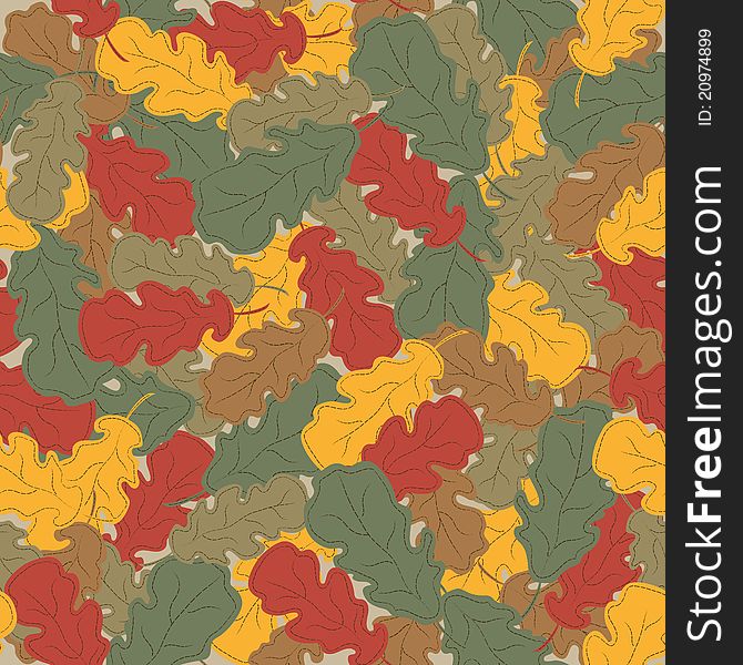 Abstract autumn background. Multi-colored oak leaves. Seamless pattern.