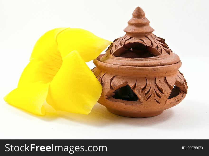 Clay decorative for spa with yellow flower. Clay decorative for spa with yellow flower.