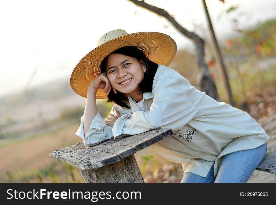 Portrait of thai farmer lady in a field