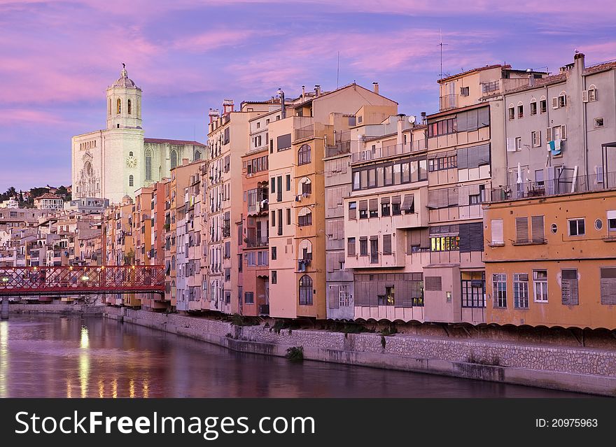 A view from Girona's Cathedral with the colourful houses and the eiffel bridge in the left side. A view from Girona's Cathedral with the colourful houses and the eiffel bridge in the left side.