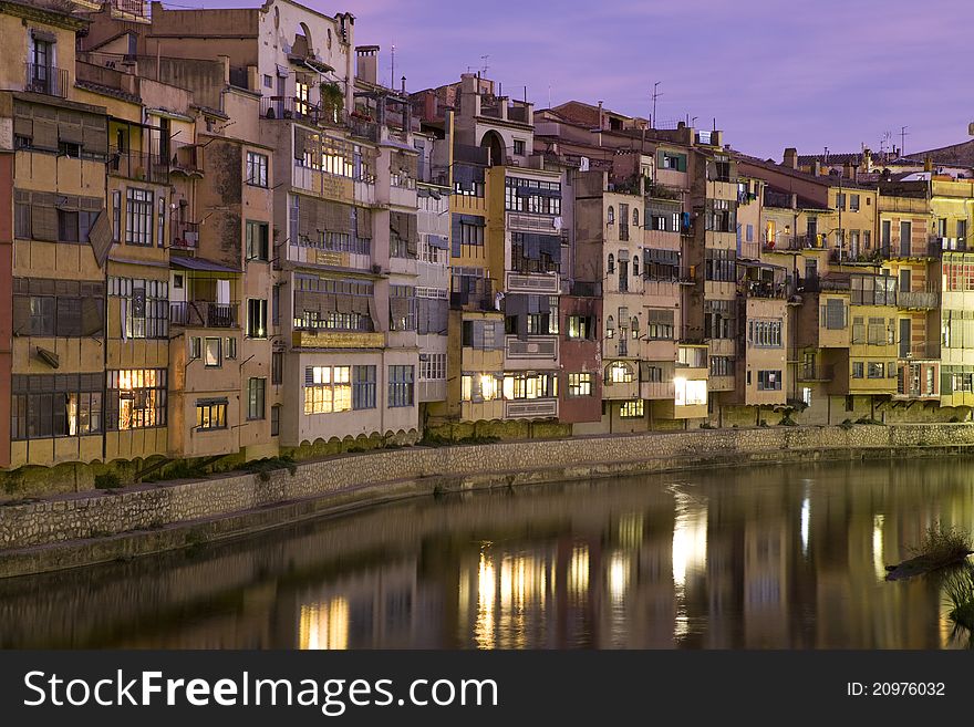 A view of the typical colourful houses over the Onyar river. A view of the typical colourful houses over the Onyar river.