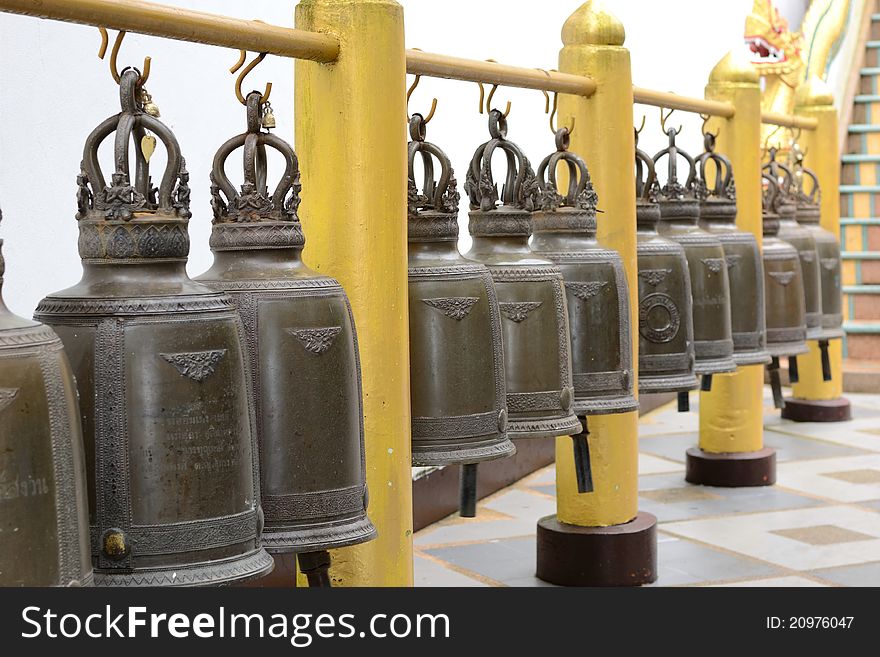 A row of bells in the temple. A row of bells in the temple