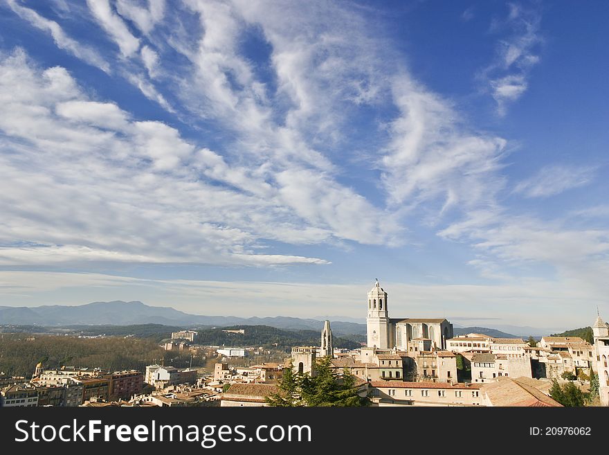 A picture of Girona's Cathedral with a great clouds over the city. A picture of Girona's Cathedral with a great clouds over the city.
