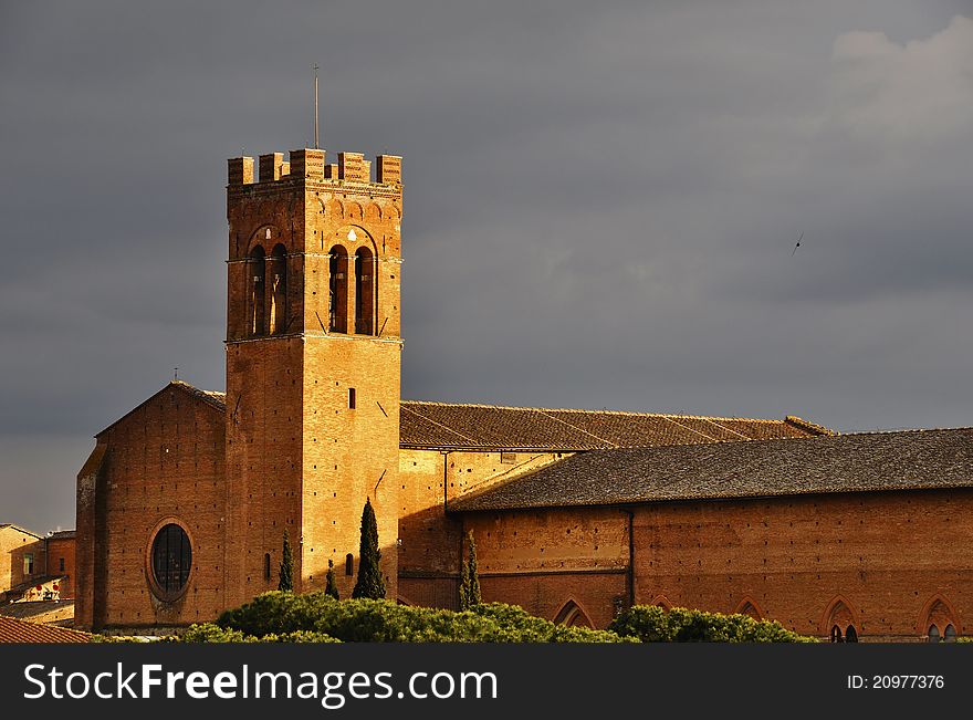 A church in Siena at sunset, Italy. A church in Siena at sunset, Italy