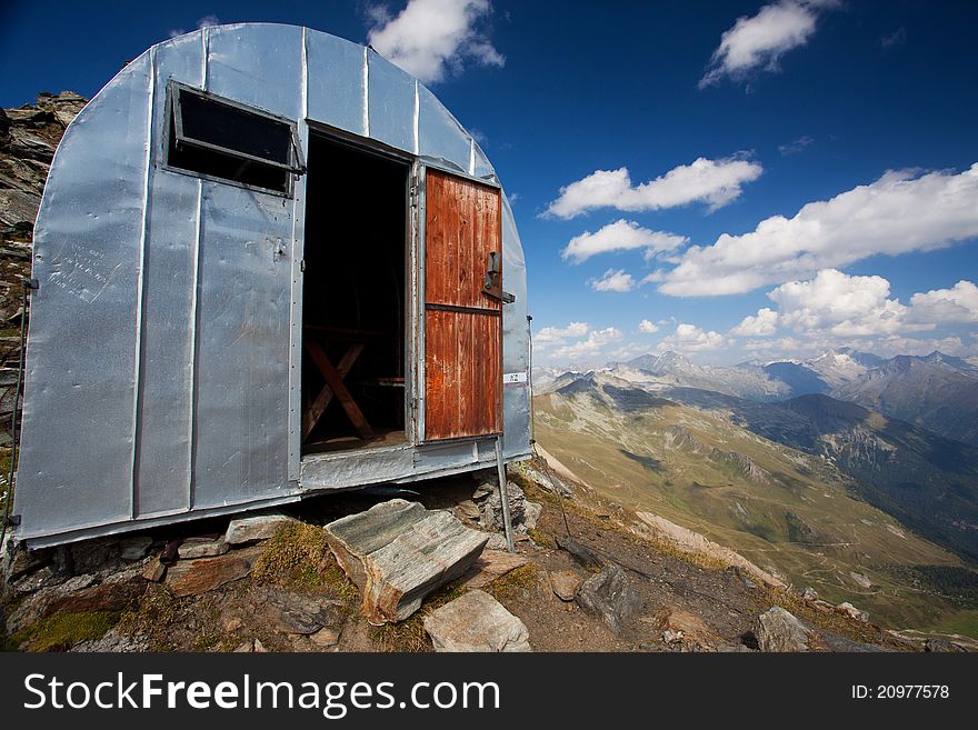 Small metal plate mountain bivouac in the mountains